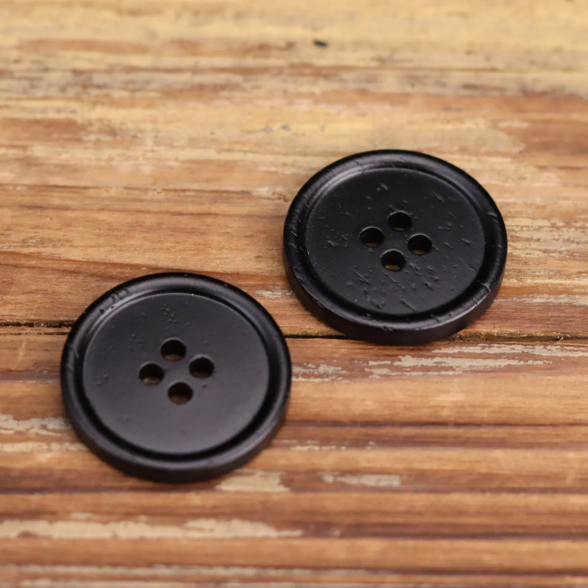 18-40L Bovine Bone Black Painted Round-Edged Four-Hole Buttons 12pcs